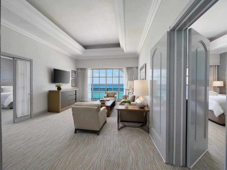 Premium bedding, down comforters, minibar, in-room safe