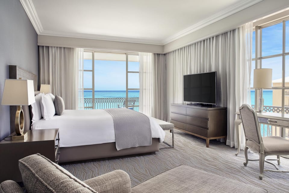Premium bedding, down comforters, minibar, in-room safe