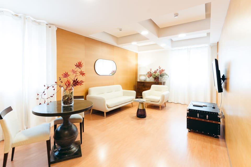 Junior Suite | Living area | Flat-screen TV