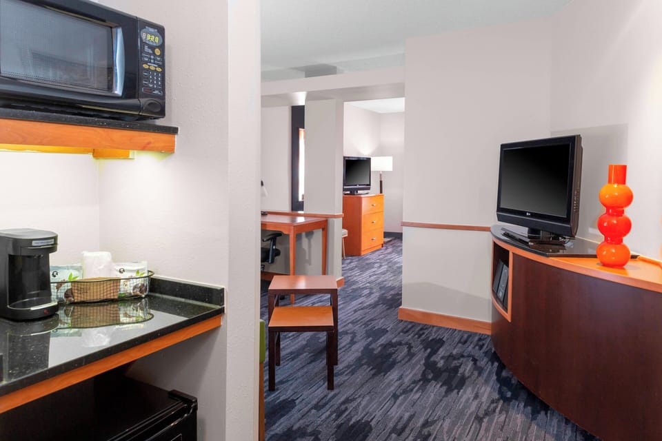 Premium bedding, memory foam beds, desk, blackout drapes