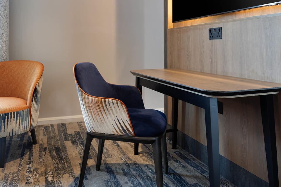 Premium Suite | In-room safe, desk, laptop workspace, blackout drapes