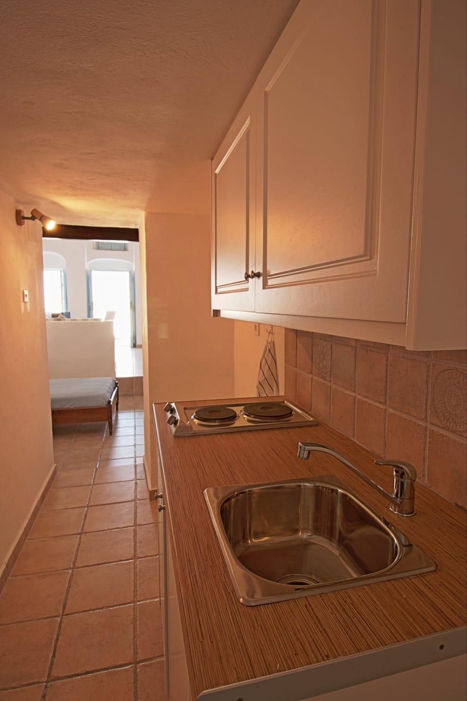 Two Bedrooms Traditional Apartment | Private kitchenette | Fridge, electric kettle
