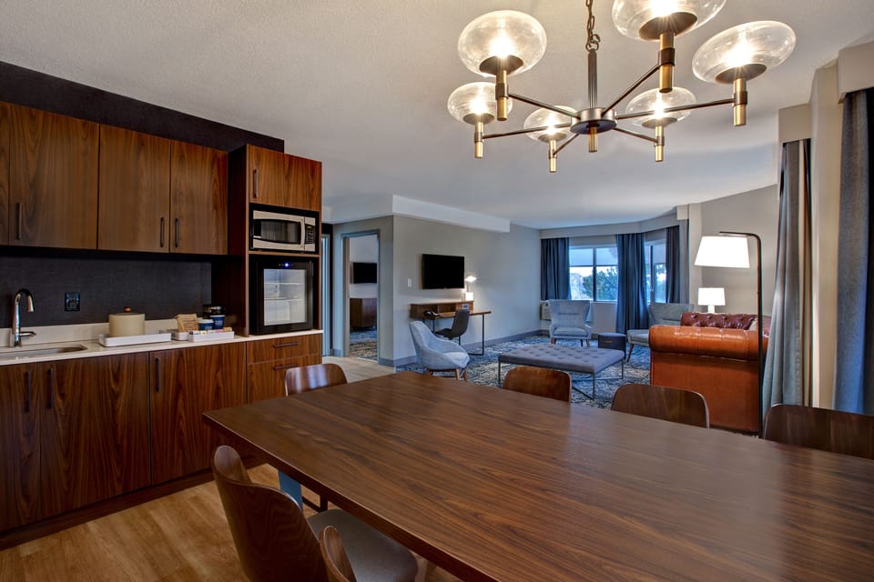 Suite, 1 King Bed with Sofa bed | Private kitchen | Fridge, microwave, coffee/tea maker