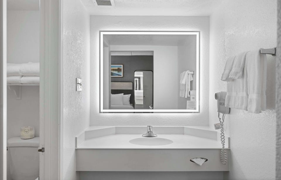 Eco-friendly toiletries, hair dryer, towels, soap