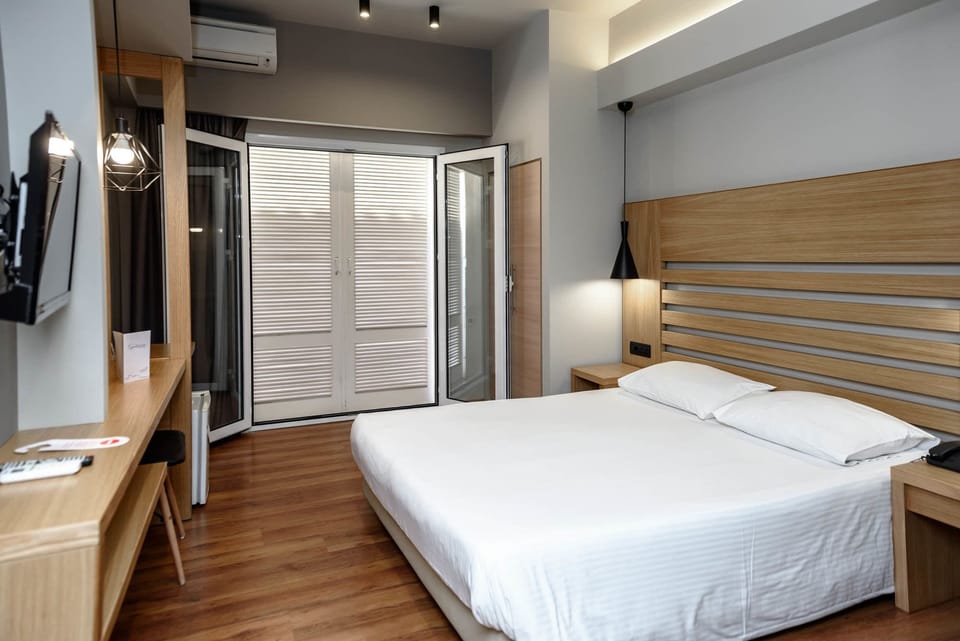 Standard Double or Twin Room, Balcony, City View | In-room safe, free WiFi, bed sheets