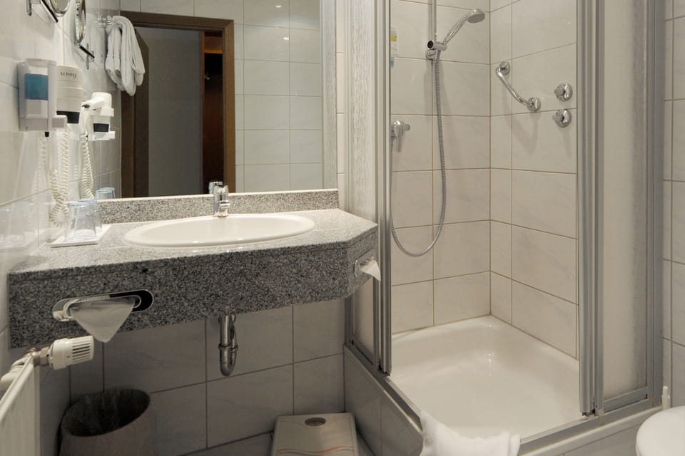 Double Room | Bathroom | Shower, hair dryer, towels, soap