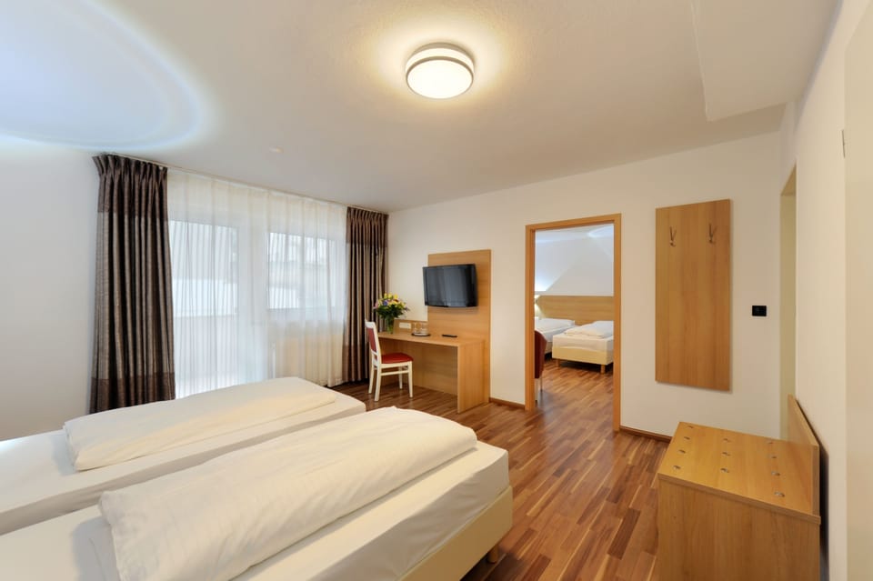 Quadruple Room | Hypo-allergenic bedding, in-room safe, desk, free WiFi