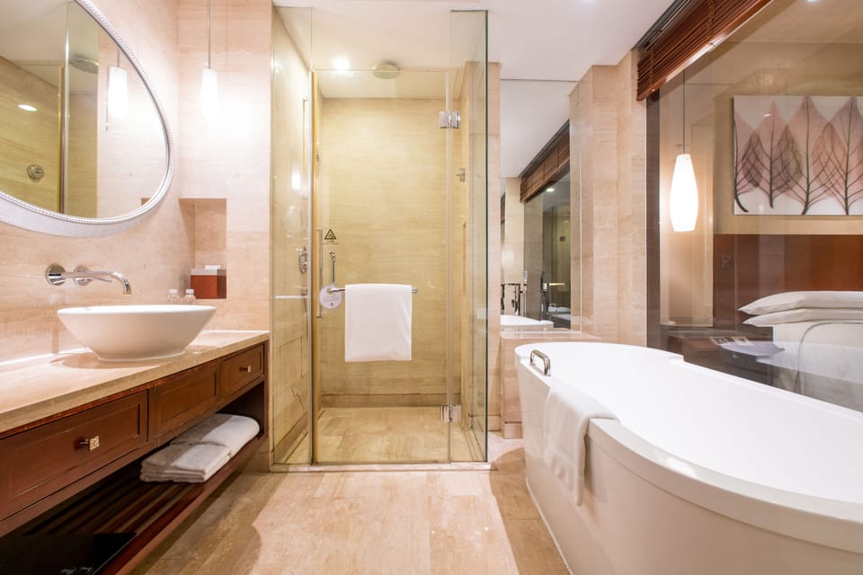 Separate tub and shower, deep soaking tub, rainfall showerhead