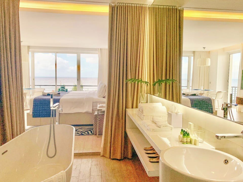 Shower, rainfall showerhead, designer toiletries, bathrobes