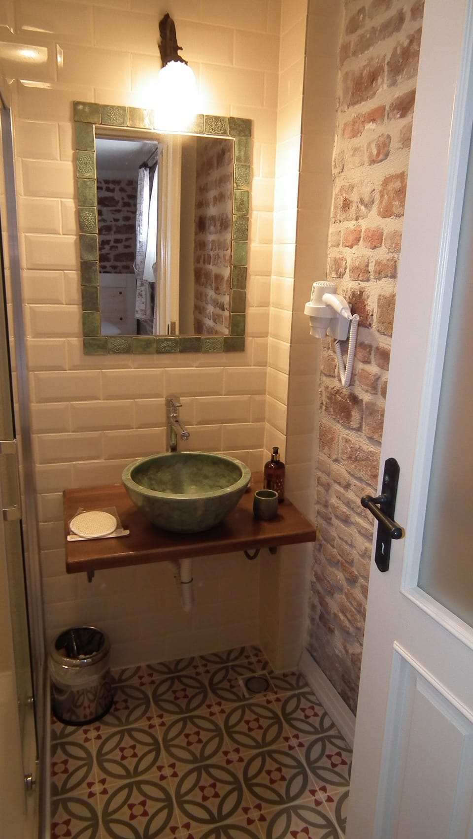 Shower, free toiletries, hair dryer, slippers