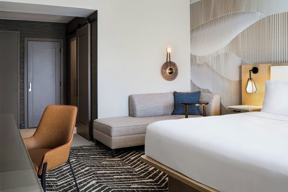 1 bedroom, premium bedding, down comforters, desk