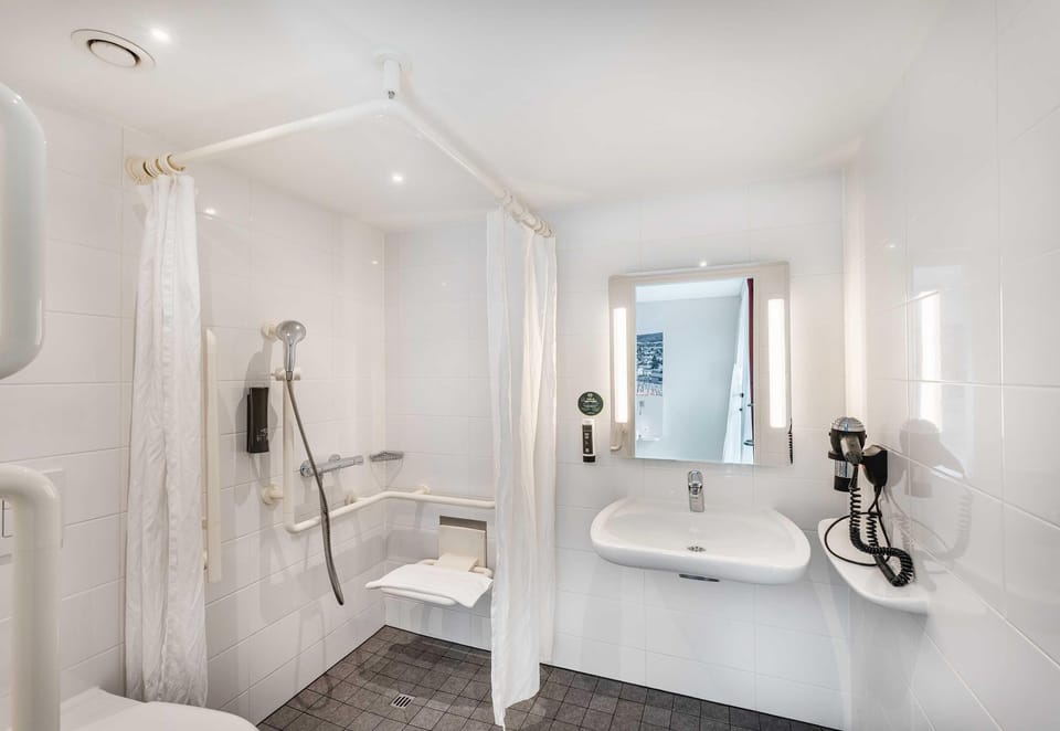 Shower, free toiletries, hair dryer, towels