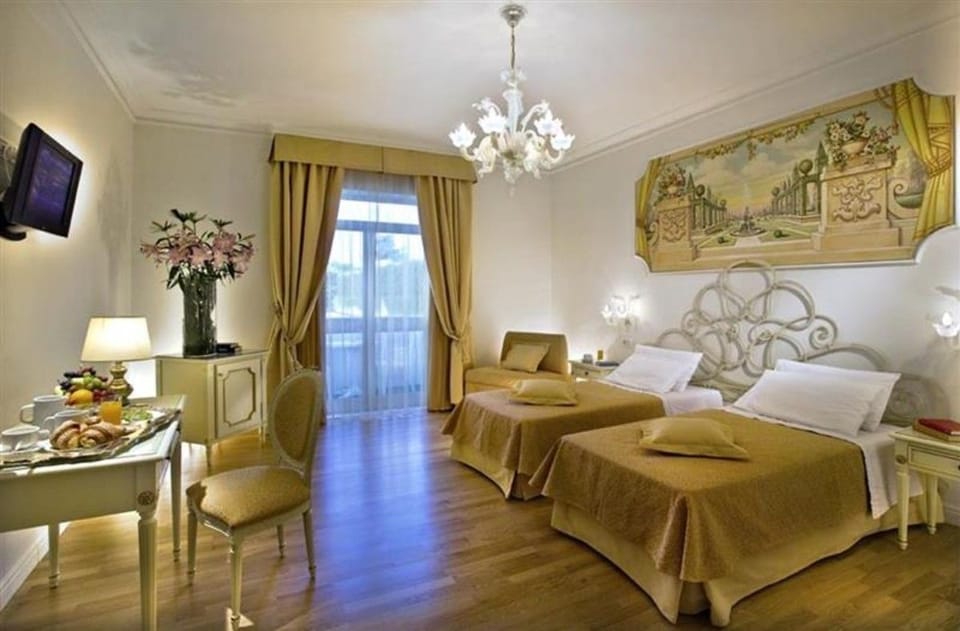 Superior Double or Twin Room | Minibar, in-room safe, desk, blackout drapes