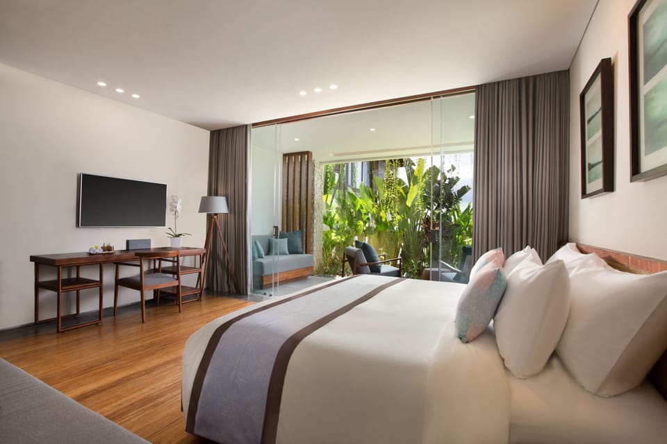 Superior Room (Candrika) | Minibar, in-room safe, desk, laptop workspace