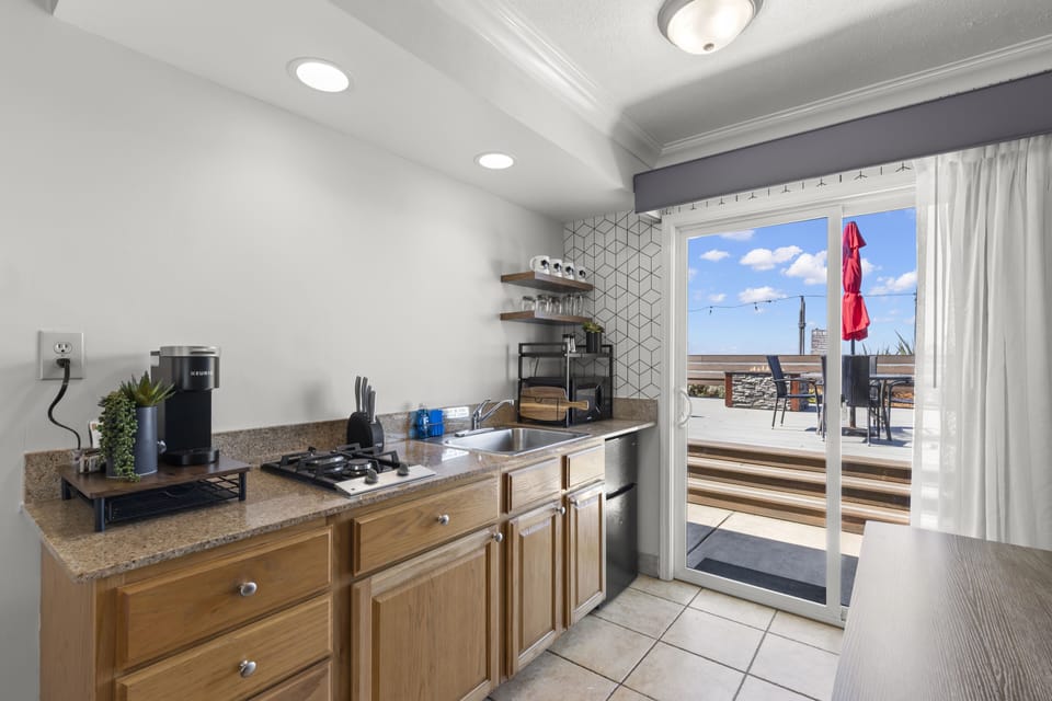 Kitchenette Room with View (Pet Friendly) | Private kitchen | Coffee/tea maker, fridge, microwave, eco-friendly cleaning products