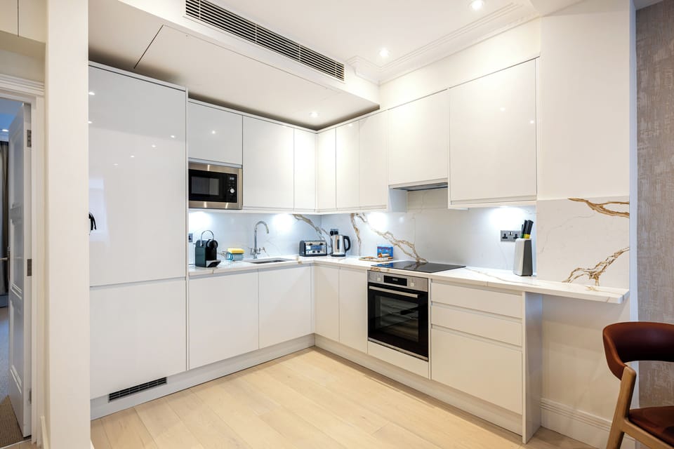 Two Bedroom Deluxe with Balcony for 325458538 | Private kitchen | Espresso maker, coffee/tea maker, full-size fridge, microwave