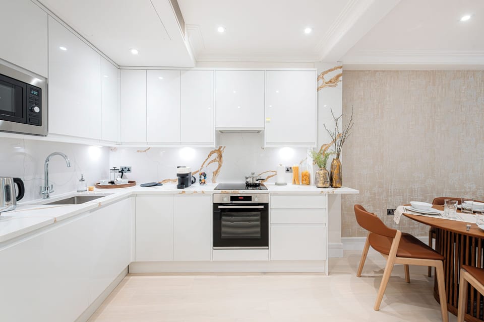 Two Bedroom Executive apartment | Private kitchen | Espresso maker, coffee/tea maker, full-size fridge, microwave