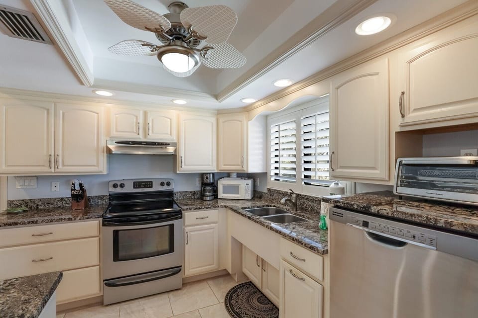 Condo, 2 Bedrooms | Private kitchen | Coffee/tea maker, fridge, microwave, dishwasher