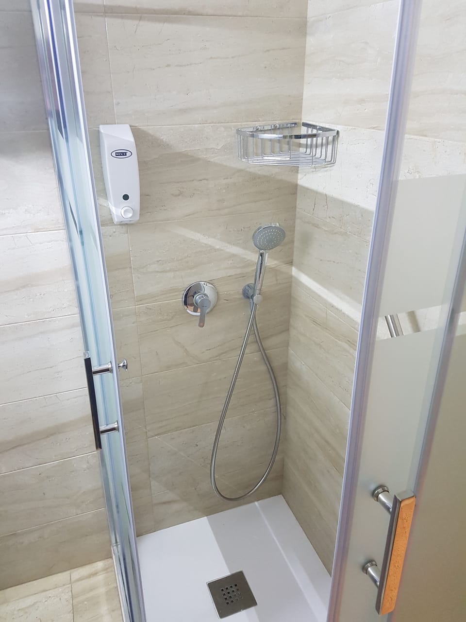 Shower, deep soaking tub, free toiletries, hair dryer