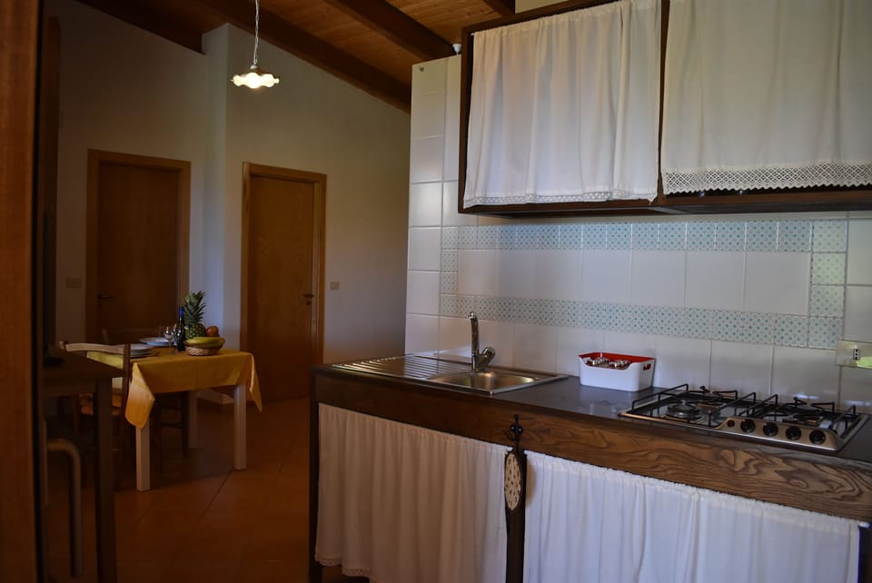 Comfort Apartment, 1 Bedroom, Patio (Margherita) | Private kitchen | Fridge, oven, stovetop, cookware/dishes/utensils