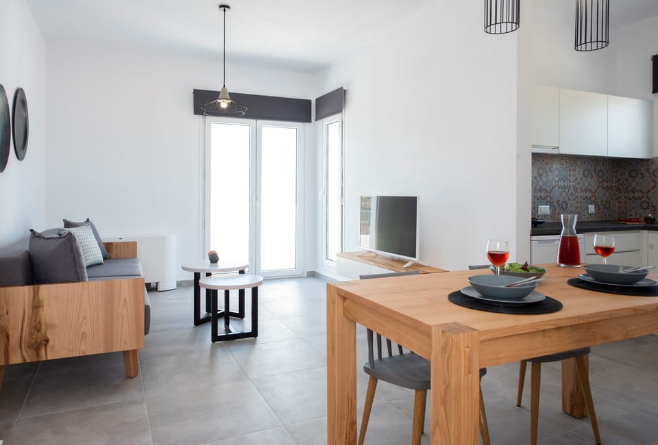 Deluxe Suite, 1 Bedroom, Hot Tub, Sea View (L) | Private kitchen | Fridge, stovetop, coffee/tea maker, electric kettle