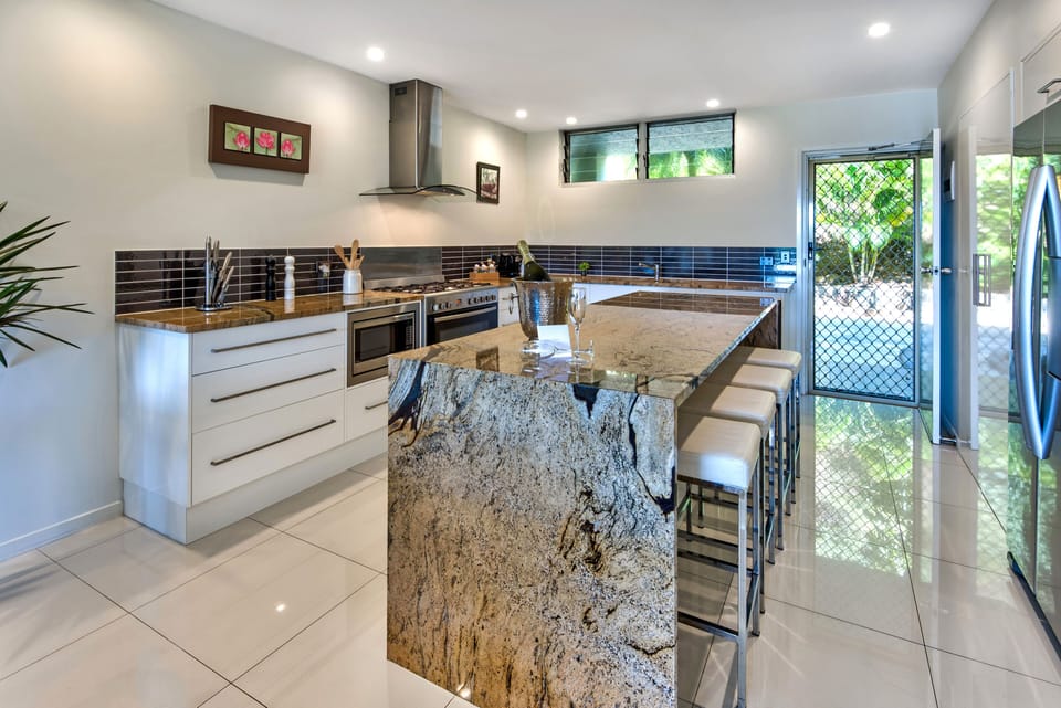 Apartment, 2 Bedrooms (2K, 1 Air Bed or 2KS, 1K, 1 Air Bed) | Private kitchen | Full-size fridge, microwave, oven, stovetop