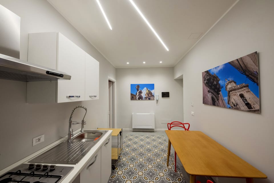 Romantic Apartment, 1 Queen Bed, Non Smoking, City View | Private kitchen | Full-size fridge, cleaning supplies