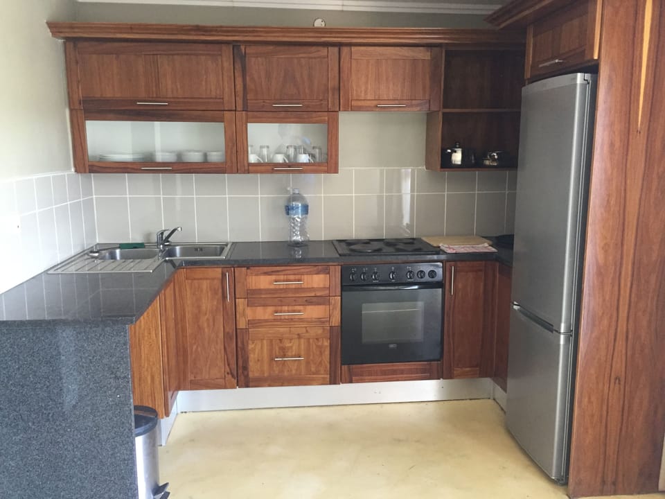 Exclusive Townhome, 2 Bedrooms | Private kitchen | Electric kettle