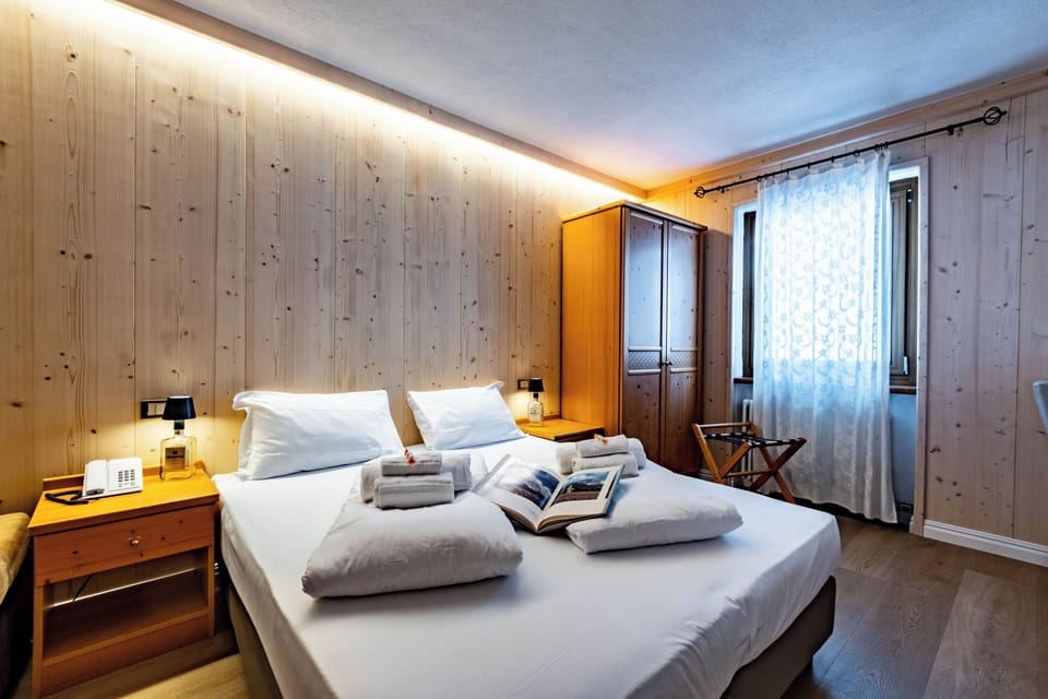 Standard Quadruple Room | Premium bedding, in-room safe, desk, free WiFi