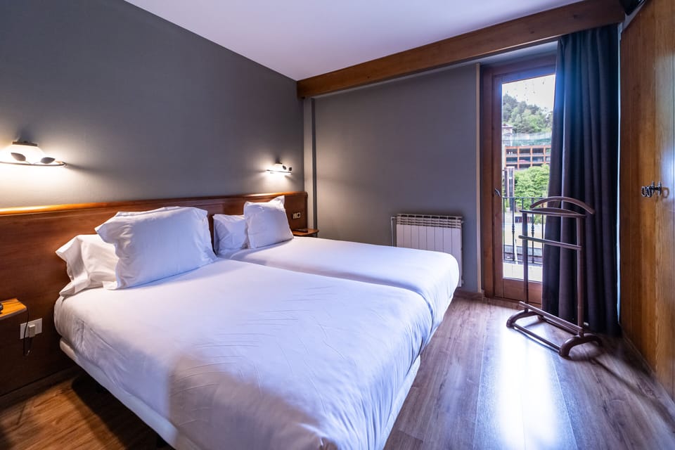Down comforters, in-room safe, laptop workspace, blackout drapes