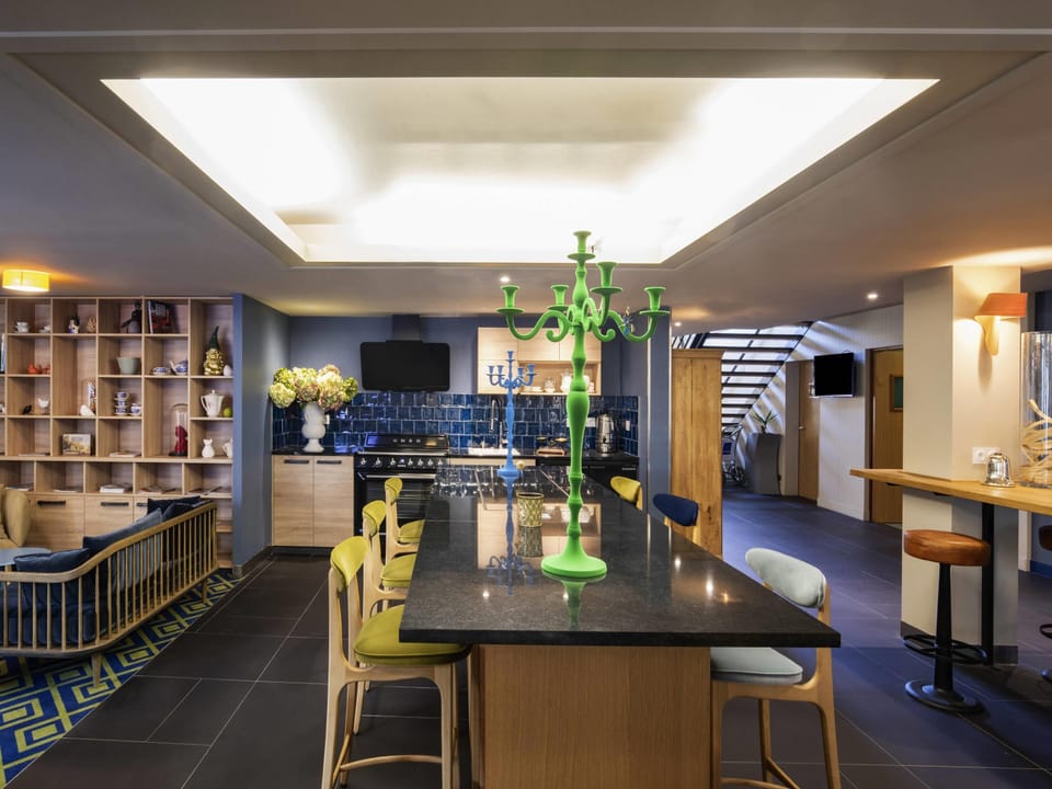 Lunch, dinner, brunch served; French cuisine, pool views 