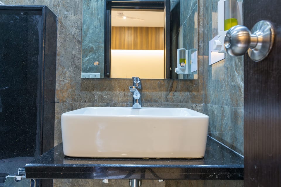 Compact Room	 | Bathroom | Shower, rainfall showerhead, free toiletries, hair dryer (on request)