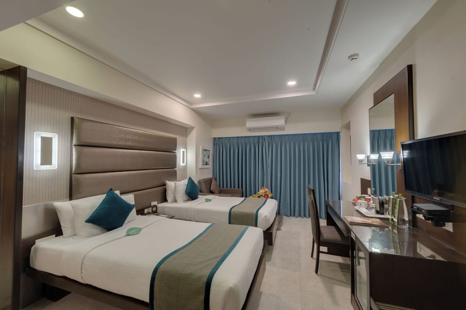 Deluxe Double Room | Pillowtop beds, in-room safe, desk, blackout drapes