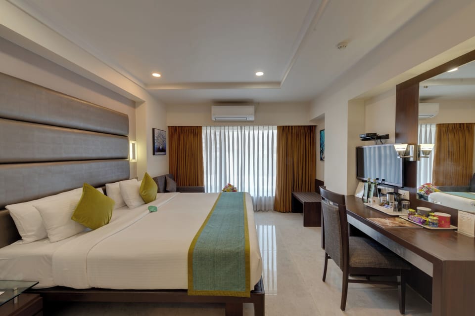 Deluxe Double Room | Pillowtop beds, in-room safe, desk, blackout drapes