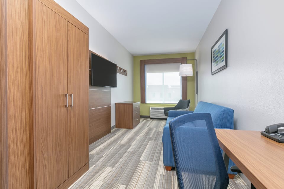 In-room safe, desk, iron/ironing board, cribs (free)