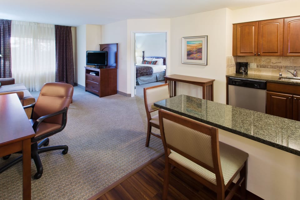 Suite, 1 King Bed | In-room safe, desk, laptop workspace, blackout drapes