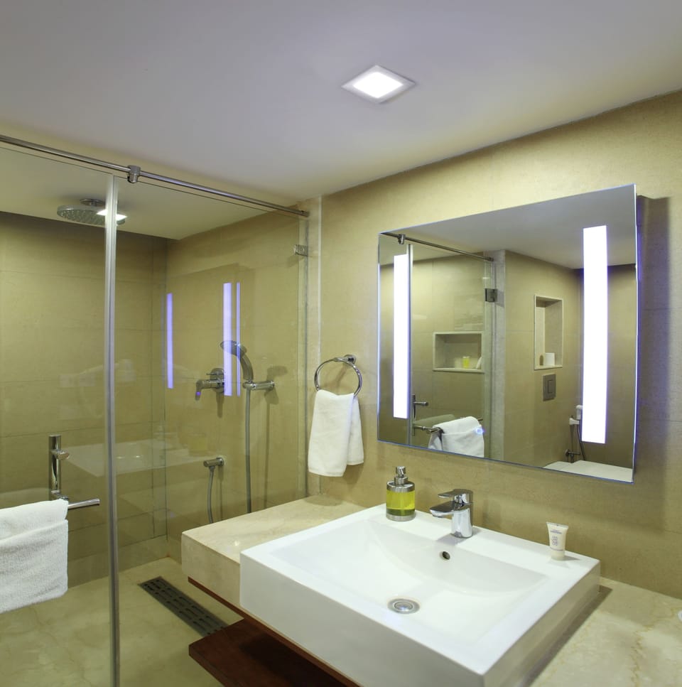 Shower, rainfall showerhead, designer toiletries, hair dryer