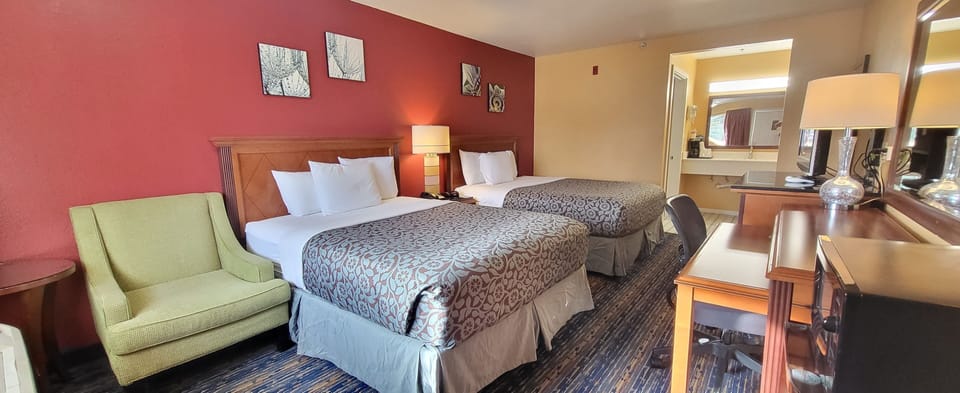 Deluxe Room, 2 Queen Beds, Non Smoking | Desk, laptop workspace, iron/ironing board, free WiFi