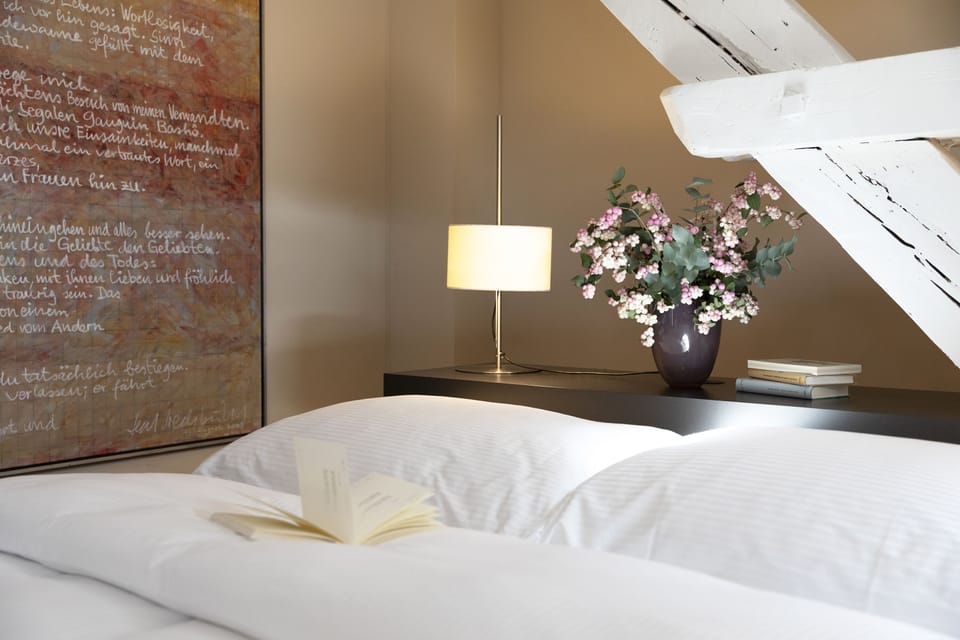 Attic Design | Hypo-allergenic bedding, minibar, in-room safe, desk