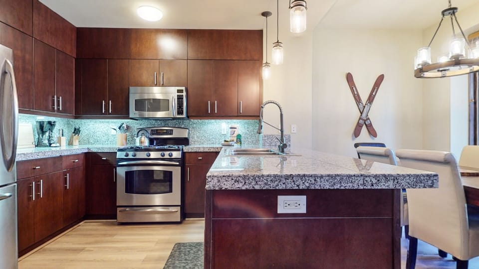 Condo, 2 Bedrooms | Private kitchen | Fridge, microwave, dishwasher, coffee/tea maker