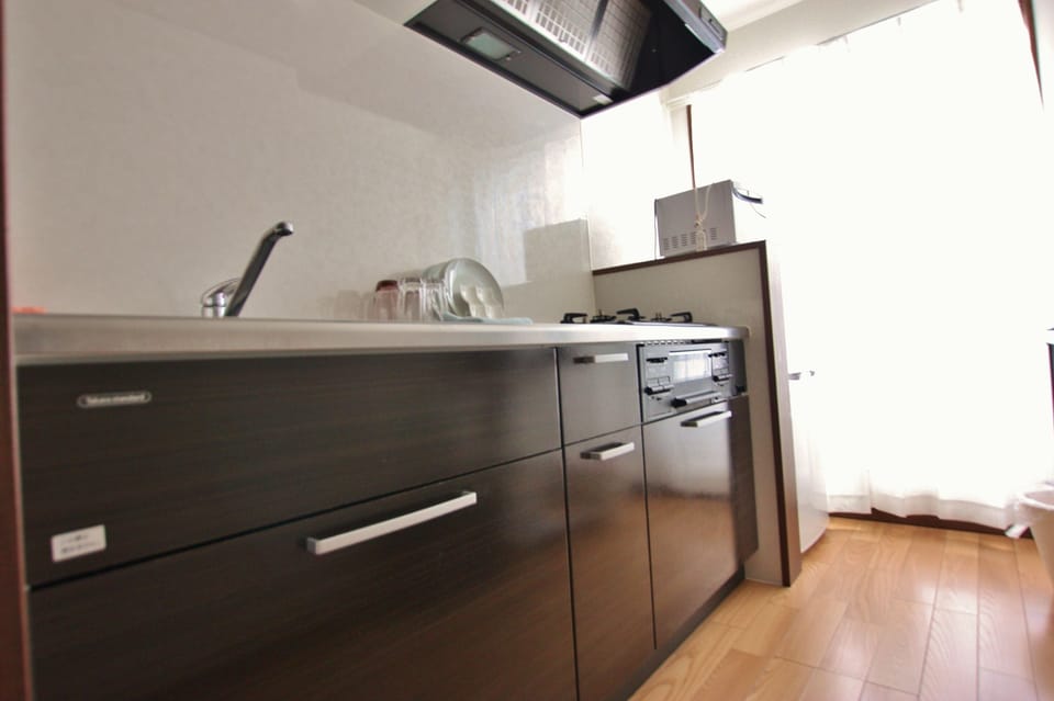 Standard Apartment, Non Smoking | Private kitchen | Fridge, microwave, stovetop, electric kettle