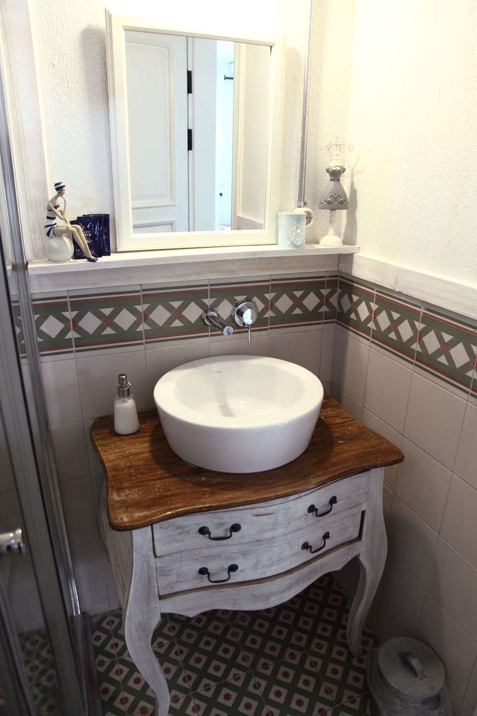 Shower, free toiletries, hair dryer, slippers