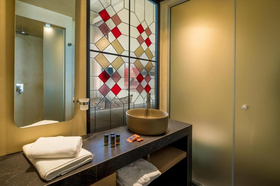 Shower, free toiletries, hair dryer, bathrobes