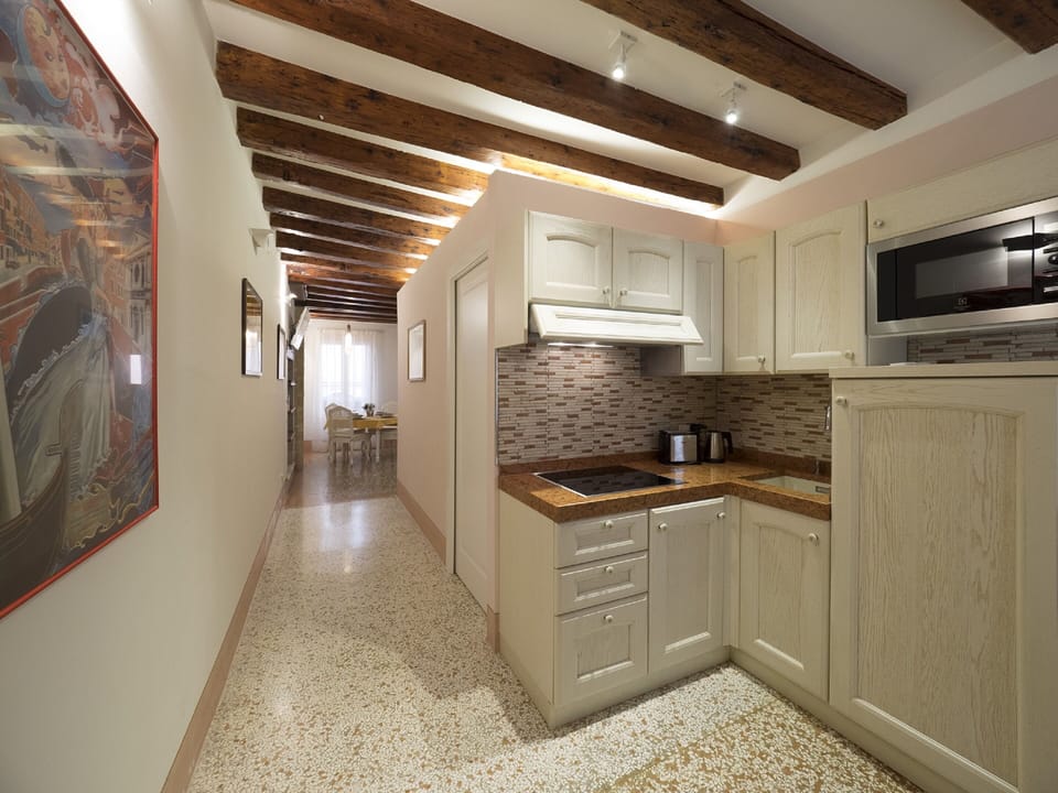 Apartment, 2 Bedrooms | Private kitchenette | Fridge, microwave, stovetop, dishwasher
