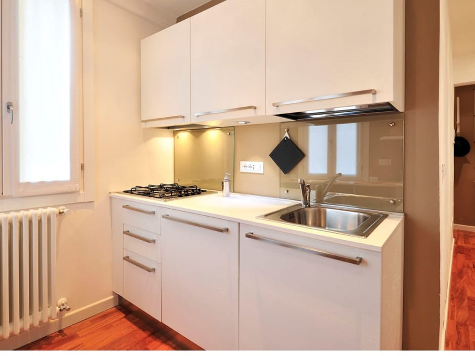 Apartment, 2 Bedrooms | Private kitchenette | Full-size fridge, microwave, stovetop, dishwasher