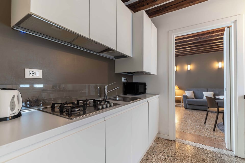 Apartment, 2 Bedrooms | Private kitchen | Full-size fridge, microwave, stovetop, dishwasher