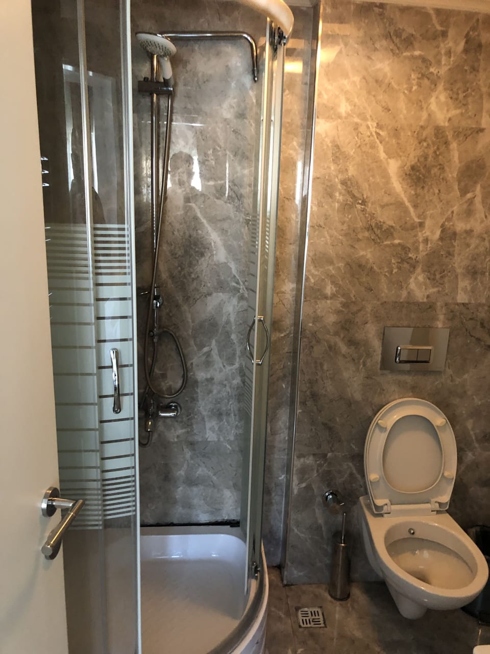 Shower, free toiletries, hair dryer, slippers