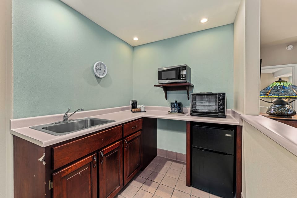 Family Suite, Multiple Beds | Living area | 36-inch flat-screen TV with cable channels, TV, DVD player
