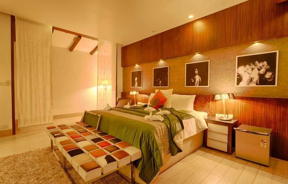 Luxury Suite, Garden View | Pillowtop beds, in-room safe, desk, blackout drapes