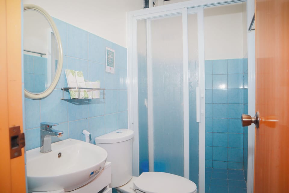 Double Room, Garden View | Bathroom | Shower, rainfall showerhead, hair dryer, slippers
